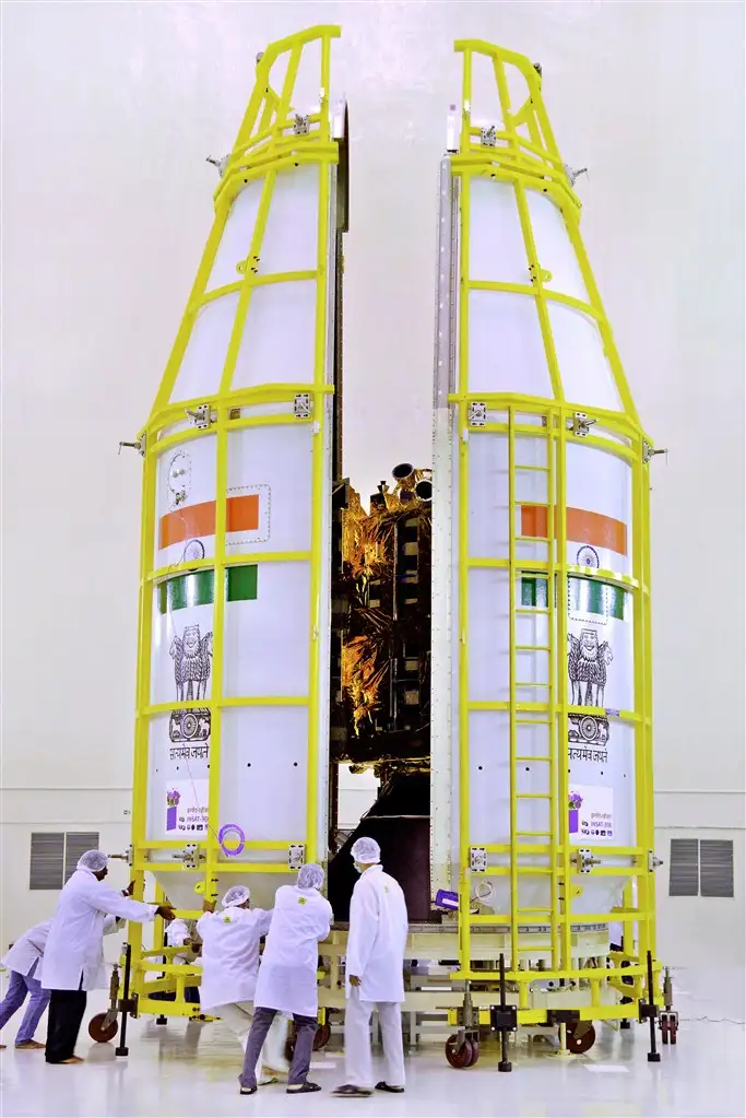 Two halves of GSLV-F05 payload fairing enclosing INSAT-3DR being closed